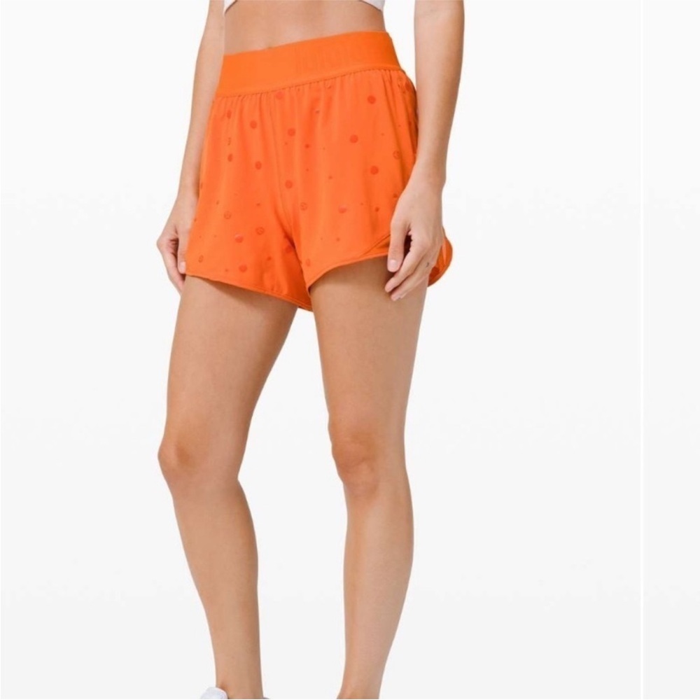Lululemon Hotty Hot Short 4" *Logo Poco Logo Foil Amber Orange size 6
